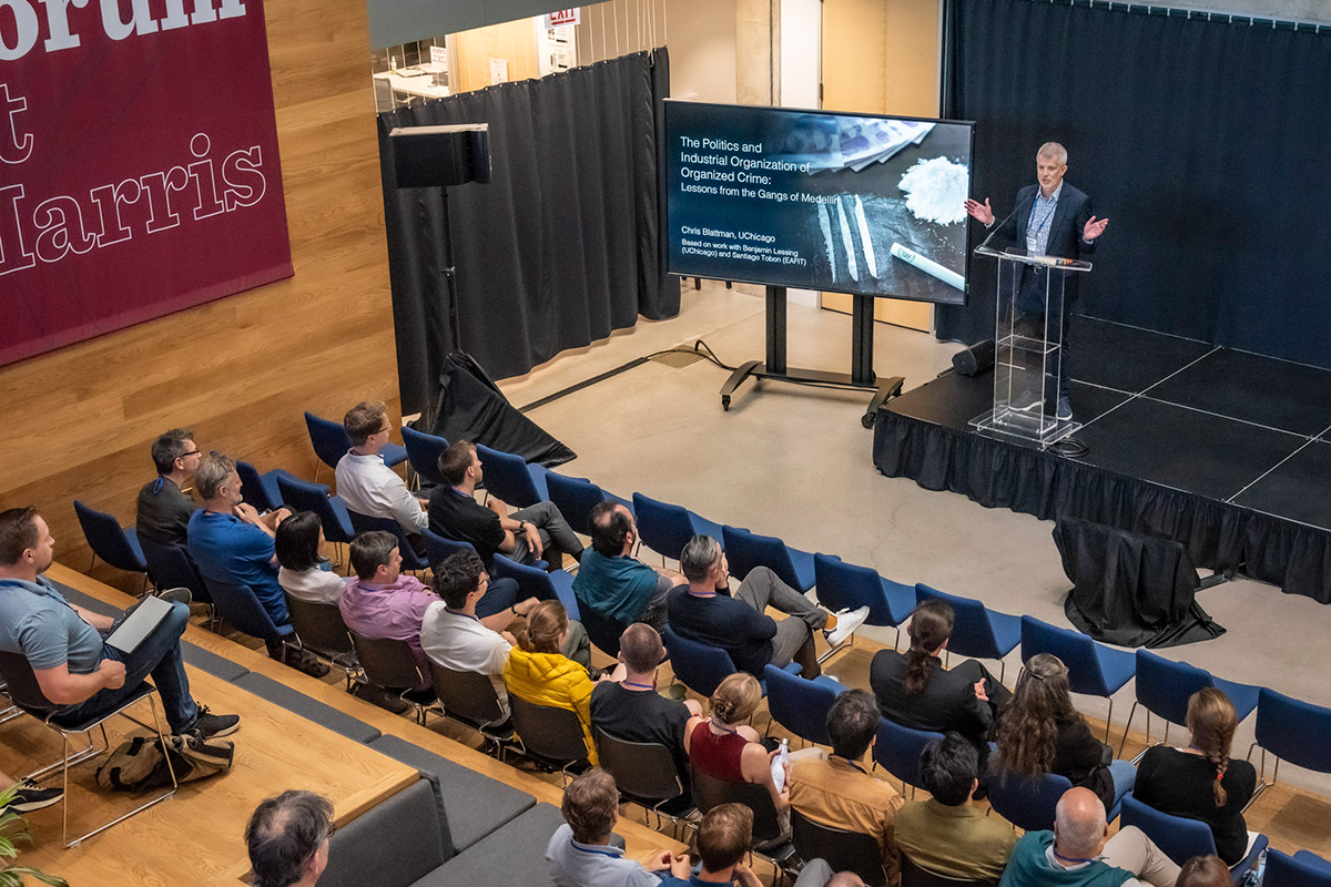 Scott Gehlbach introducing the keynote at the Harris Forum.